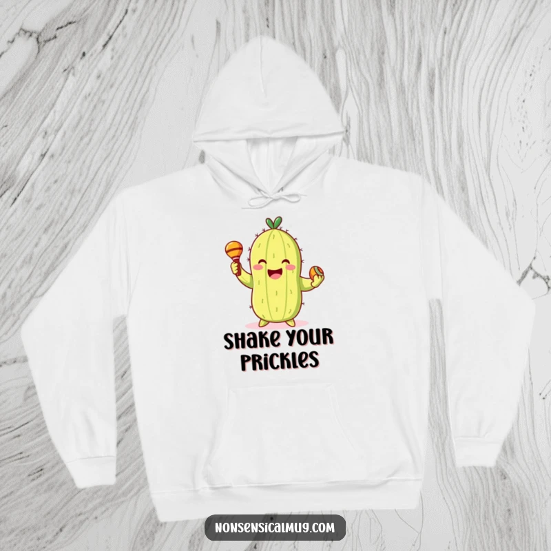 Funny Hoodie: Smiling cactus character gleefully dancing with maracas, bringing warmth and festivity.