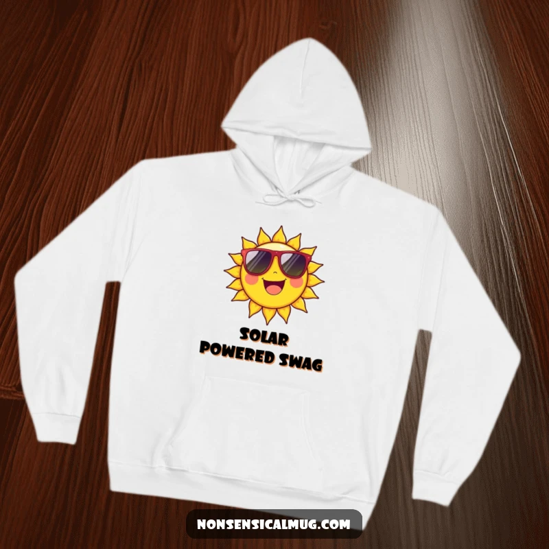 Funny Hoodie: Cheerful sun character beaming brightly with oversized sunglasses, offering comfort and style.