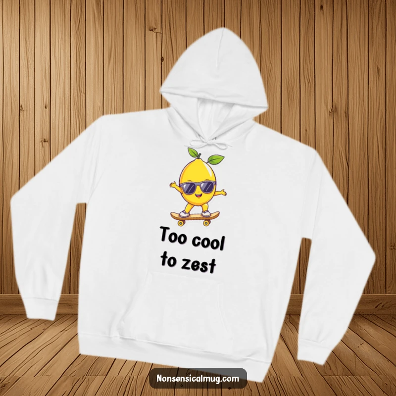 Funny lemon wearing sunglasses on a skateboard, featured on a cozy hoodie for a humorous, cool look.