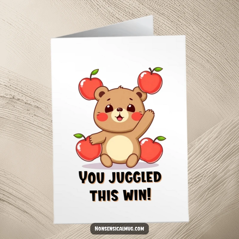 Funny free printable congratulations card: a round bear character playfully juggling three shiny apples, celebrating success.