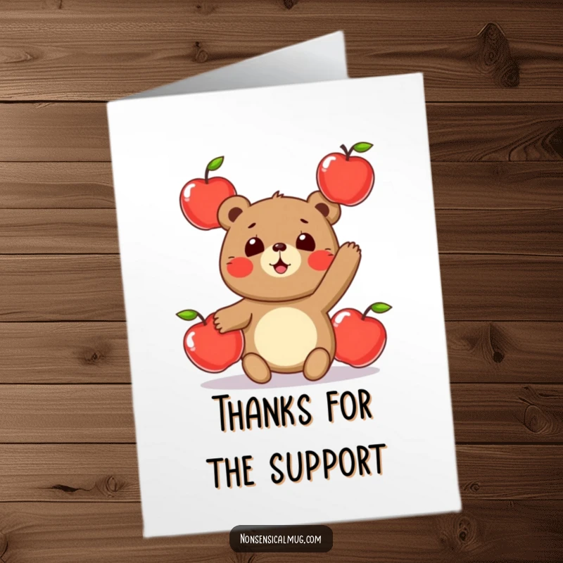 Funny free printable thank you card: a round bear character playfully juggling three shiny apples, expressing gratitude.