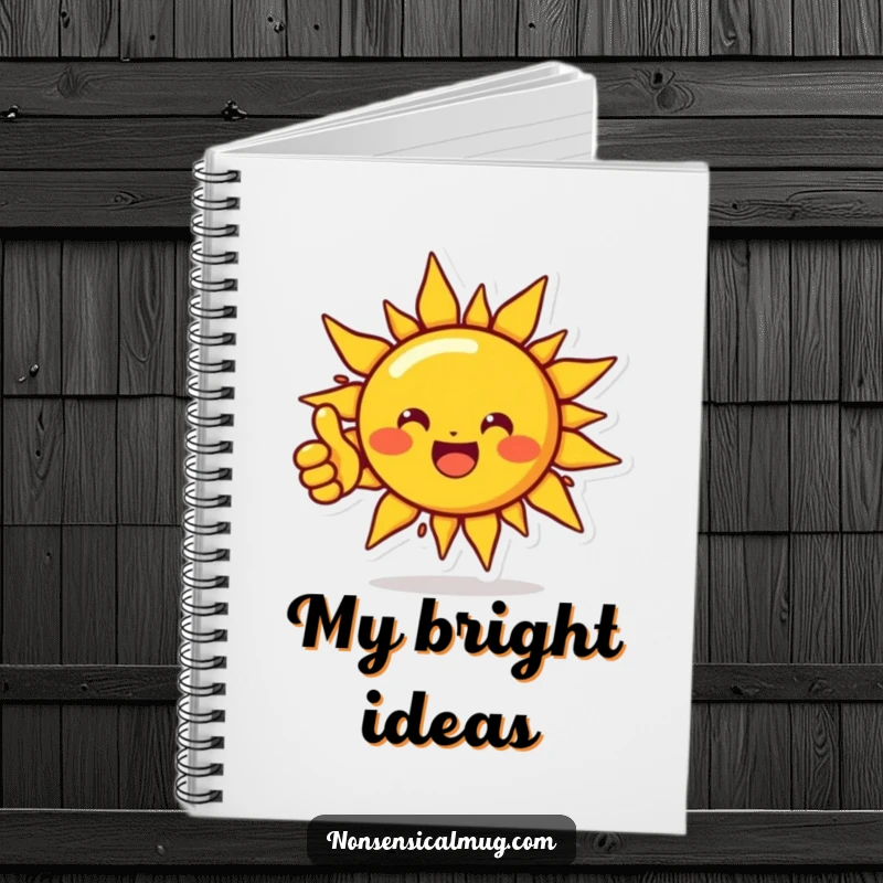 Funny notebook with a beaming sun character giving a thumbs up, designed for capturing ideas with sunny optimism and a humorous touch.