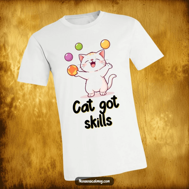 Funny Kawaii Cat T-Shirt: An adorable kawaii cat expertly juggles three vibrant balls, showcasing feline dexterity.