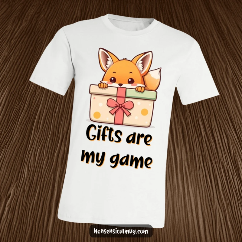 Kawaii Fox T-Shirt: A sweet kawaii fox peeking from behind a huge, colorful gift, looking curious.